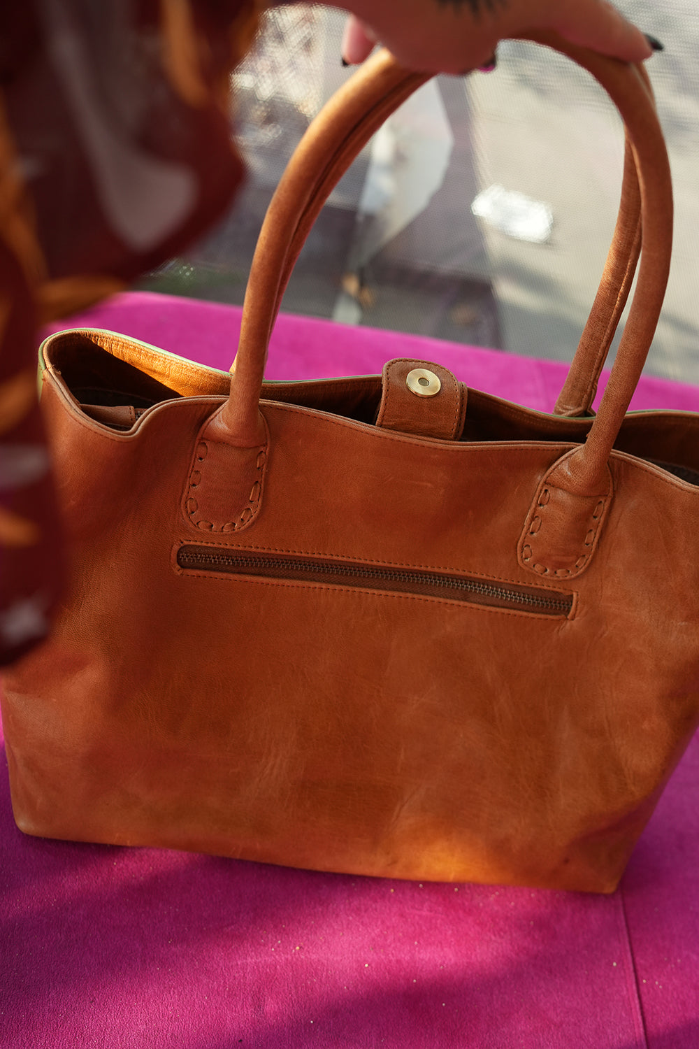 Meet the Desert Siren Tote in Sage and Caramel. A handcrafted leather tote with hand tooled motives artwork, long handles and practical interior compartments.