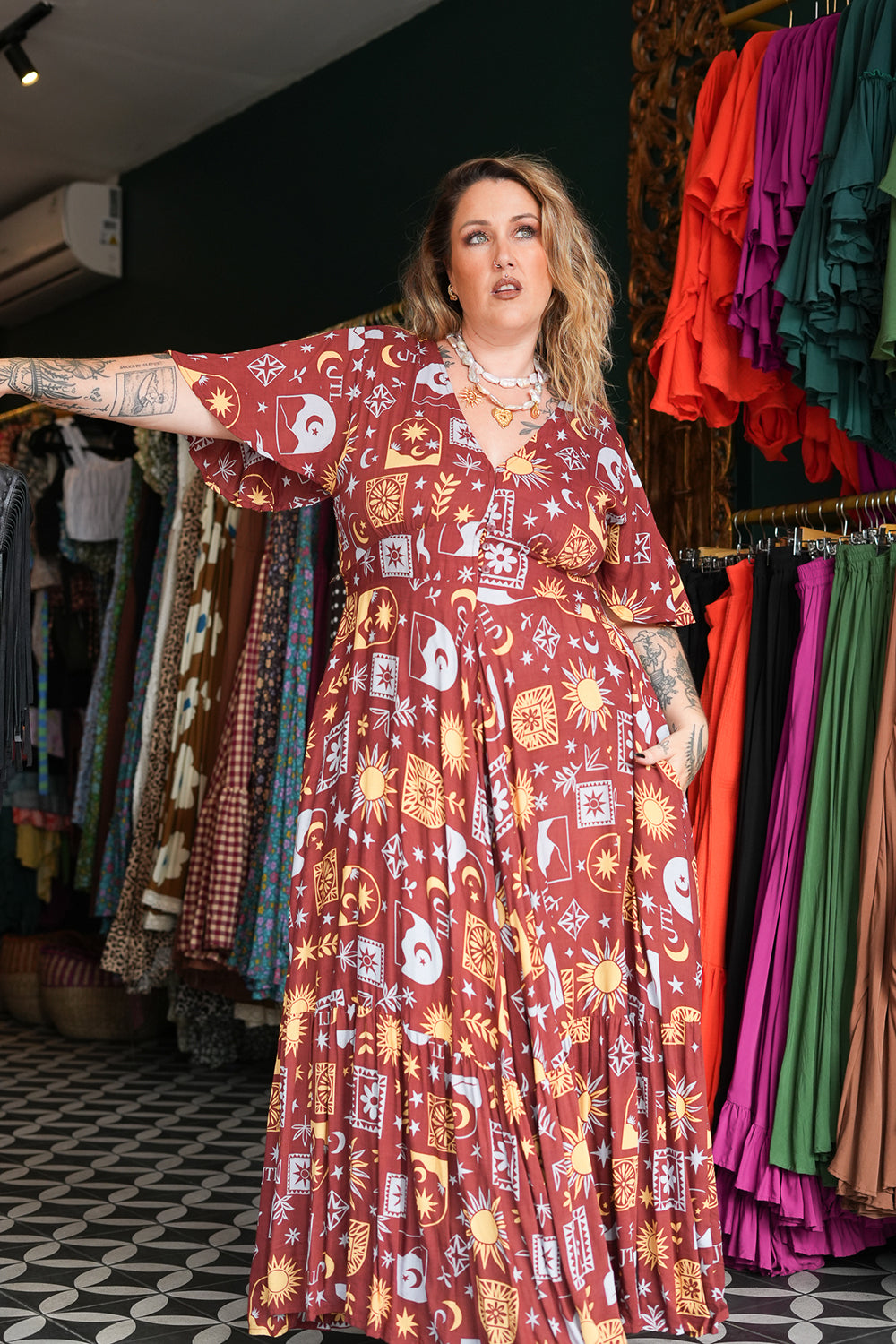 Shop the Mary Maxi Dress in Celestial Moon, with butterfly sleeves, deep V-neck and a flowing full circle skirt. Handmade in Bali by Jinx the Label.