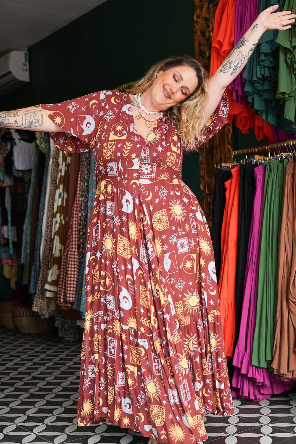 Shop the Mary Maxi Dress in Celestial Moon, with butterfly sleeves, deep V-neck and a flowing full circle skirt. Handmade in Bali by Jinx the Label.