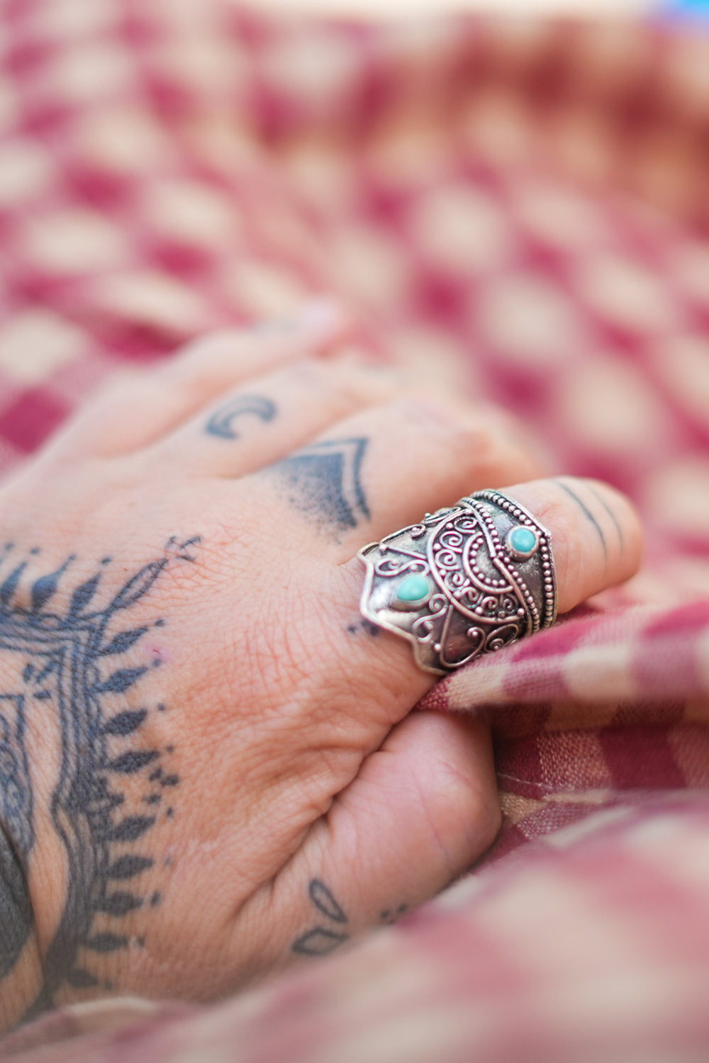 Discover the Wanderer Ring by Jinx the Label, an ornate sterling silver statement ring featuring natural turquoise stones and intricate bohemian detailing.