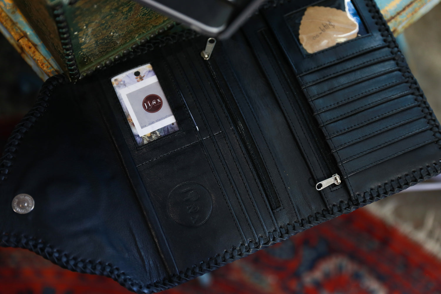 Black Dahlia Gorgeous leather clutch