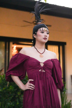Meet the Amazonian Maxi Dress in Maroon, a flowing rayon maxi with an off shoulder neckline, keyhole bodice, balloon sleeves and sweeping tiers.