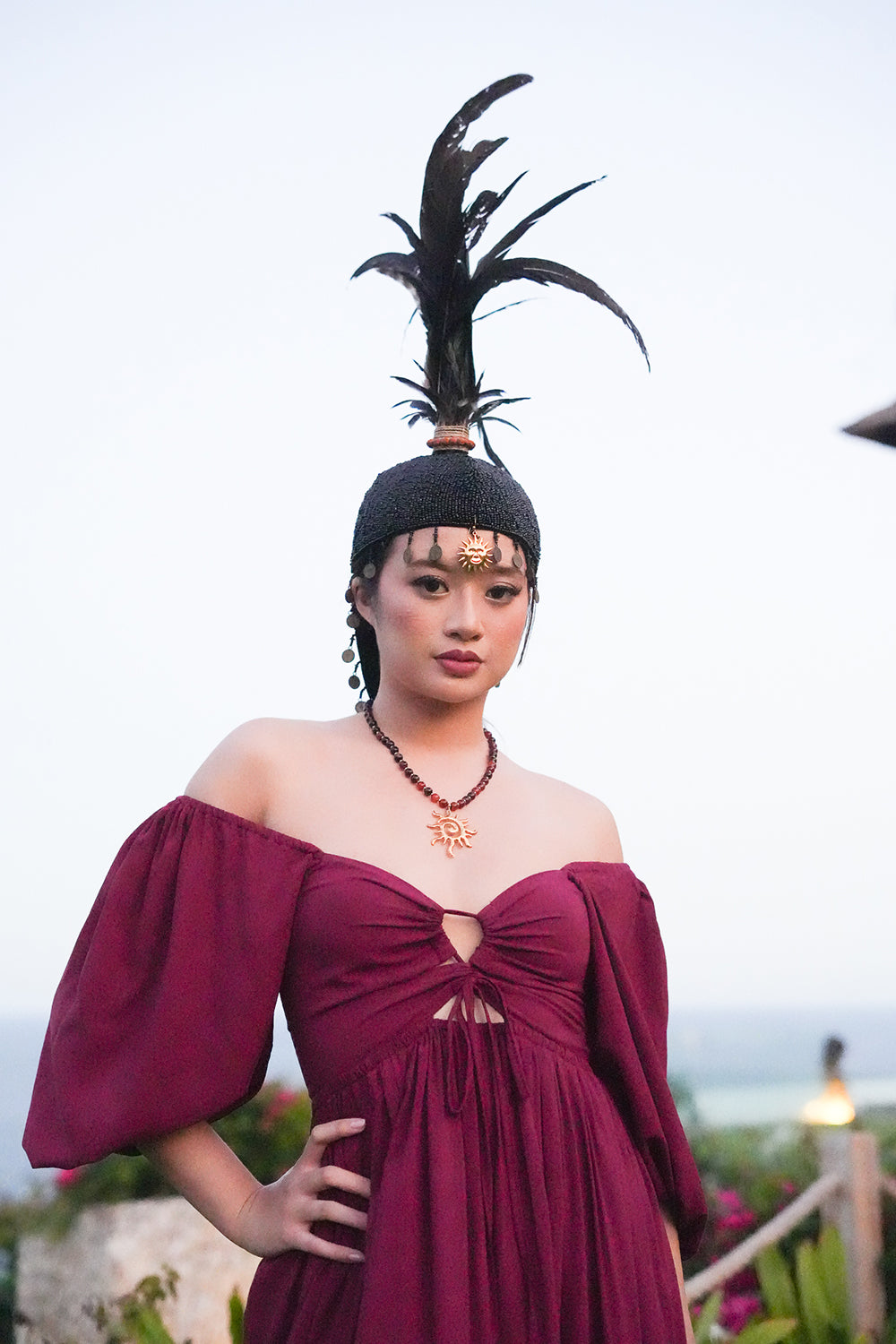 Meet the Amazonian Maxi Dress in Maroon, a flowing rayon maxi with an off shoulder neckline, keyhole bodice, balloon sleeves and sweeping tiers.