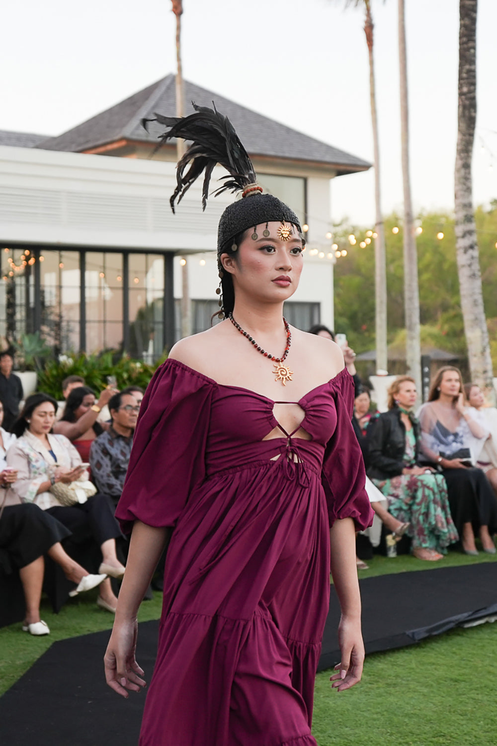 Meet the Amazonian Maxi Dress in Maroon, a flowing rayon maxi with an off shoulder neckline, keyhole bodice, balloon sleeves and sweeping tiers.