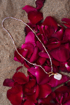 Shop the Baroque Pearl Necklace in Pink, with seed pearls and a luminous baroque pearl pendant from the Earth Altering collection by Jinx the Label.