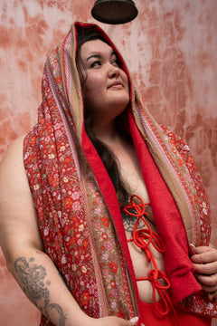 The Calypso One Piece in Orange by Jinx the Label. Ethically handmade in Bali with an adjustable lace-up front, flattering fit and inclusive sizing.