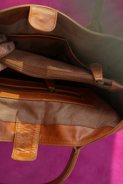 Meet the Desert Siren Tote in Sage and Caramel. A handcrafted leather tote with hand tooled motives artwork, long handles and practical interior compartments.