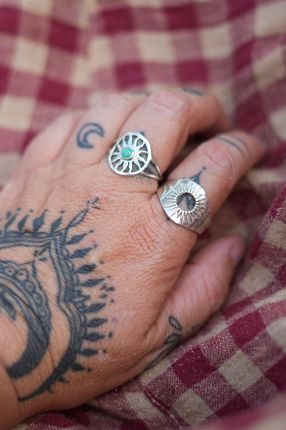 Discover the Eclipse Ring by Jinx the Label, a bold sterling silver statement ring featuring an open centre and hand worked celestial sunburst detailing.