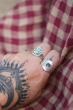 Discover the Eclipse Ring by Jinx the Label, a bold sterling silver statement ring featuring an open centre and hand worked celestial sunburst detailing.