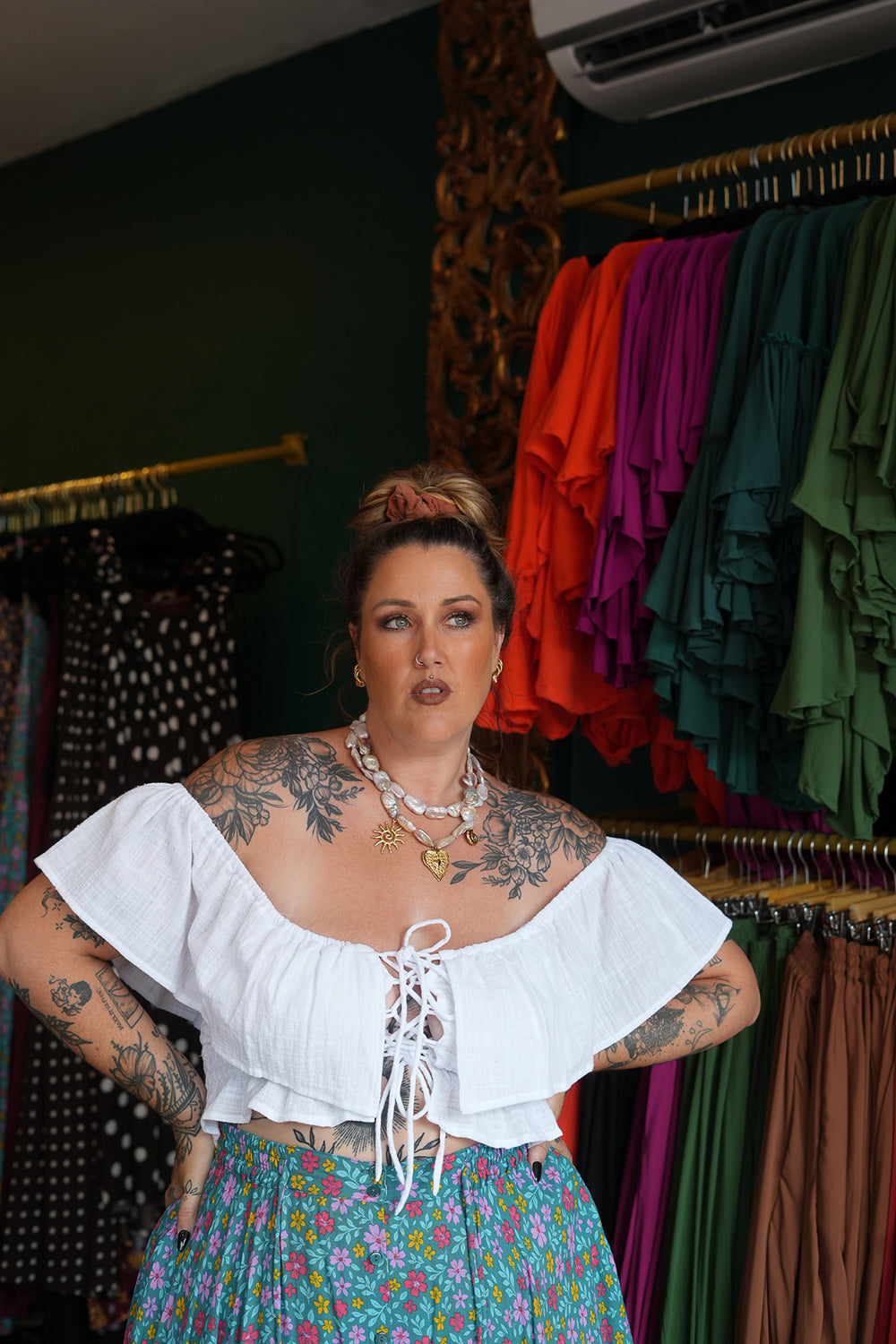 Meet the Fae Skirt in Aqua Bloom, a flowing floral boho maxi with an elastic waist, drawstring, buttons and pockets. Wear it as a skirt or strapless dress.