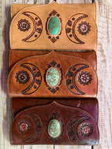 Hand tooled leather purse with chrysocolla crystal feature