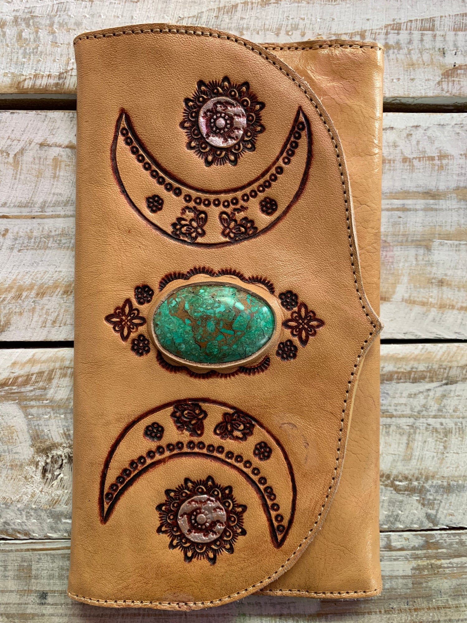 Hand tooled leather purse with chrysocolla crystal feature