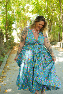 Meet the Jessie Maxi Dress in Aqua Bloom, a dreamy floral maxi with a tie front bodice, plunging neckline, flowing tiered skirt and pockets. Handmade in Bali.