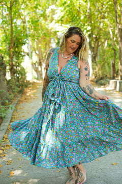 Meet the Jessie Maxi Dress in Aqua Bloom, a dreamy floral maxi with a tie front bodice, plunging neckline, flowing tiered skirt and pockets. Handmade in Bali.