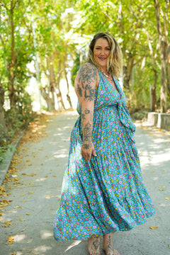 Meet the Jessie Maxi Dress in Aqua Bloom, a dreamy floral maxi with a tie front bodice, plunging neckline, flowing tiered skirt and pockets. Handmade in Bali.