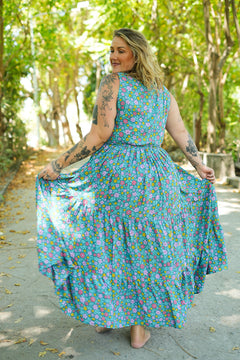 Meet the Jessie Maxi Dress in Aqua Bloom, a dreamy floral maxi with a tie front bodice, plunging neckline, flowing tiered skirt and pockets. Handmade in Bali.