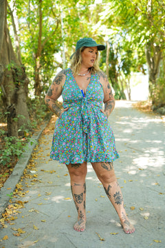 Meet the Jessie Mini Dress in Aqua Bloom, a playful floral mini with an adjustable bust tie, elastic waist, frilled hem and pockets. Handmade in Bali.