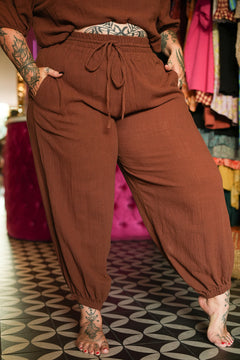 Meet the Juno Long Pants in Cocoa, relaxed cotton boho pants with pockets, drawstring waist and gathered ankles. Pair with the matching Marshya Top.