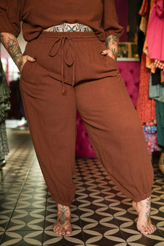 Meet the Juno Long Pants in Cocoa, relaxed cotton boho pants with pockets, drawstring waist and gathered ankles. Pair with the matching Marshya Top.