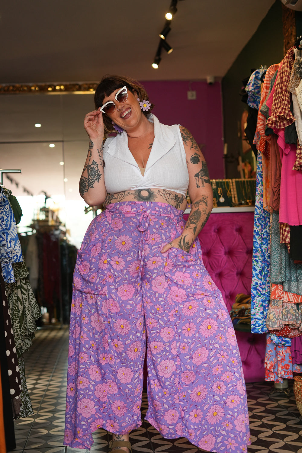 Meet the Kirana Pants in Sugarbloom. Floaty rayon wide leg pants in our dreamy purple and pink floral print, with an elastic waist, drawstring and pockets.