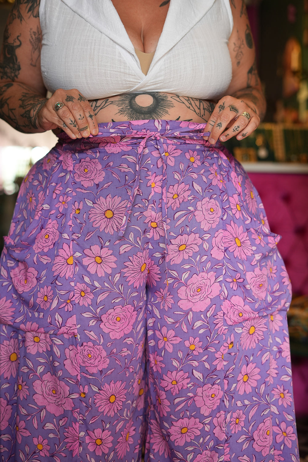 Meet the Kirana Pants in Sugarbloom. Floaty rayon wide leg pants in our dreamy purple and pink floral print, with an elastic waist, drawstring and pockets.