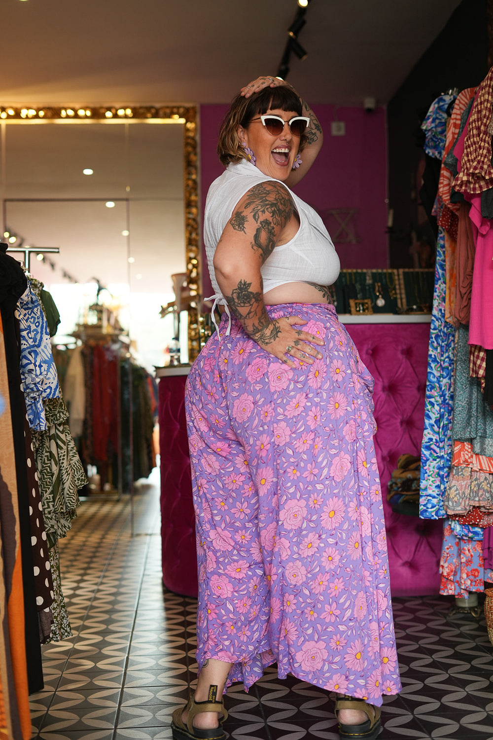 Meet the Kirana Pants in Sugarbloom. Floaty rayon wide leg pants in our dreamy purple and pink floral print, with an elastic waist, drawstring and pockets.