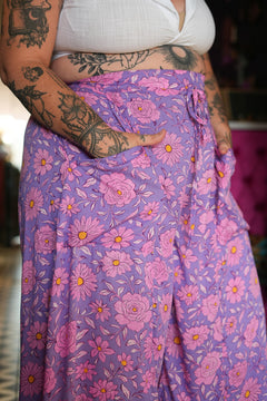Meet the Kirana Pants in Sugarbloom. Floaty rayon wide leg pants in our dreamy purple and pink floral print, with an elastic waist, drawstring and pockets.