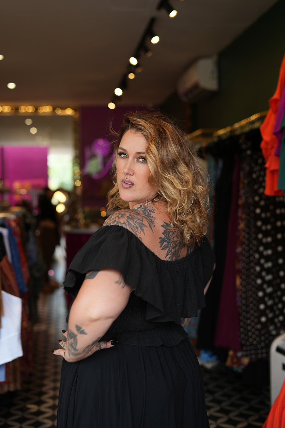 Maria Top in soft black cotton with an off-shoulder ruffle neckline, adjustable lace up front and shirred waist. Handmade in Bali by Jinx the Label.