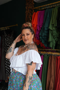 Maria Top in soft White Cotton with an off-shoulder ruffle neckline, adjustable lace up front and shirred waist. Handmade in Bali by Jinx the Label.