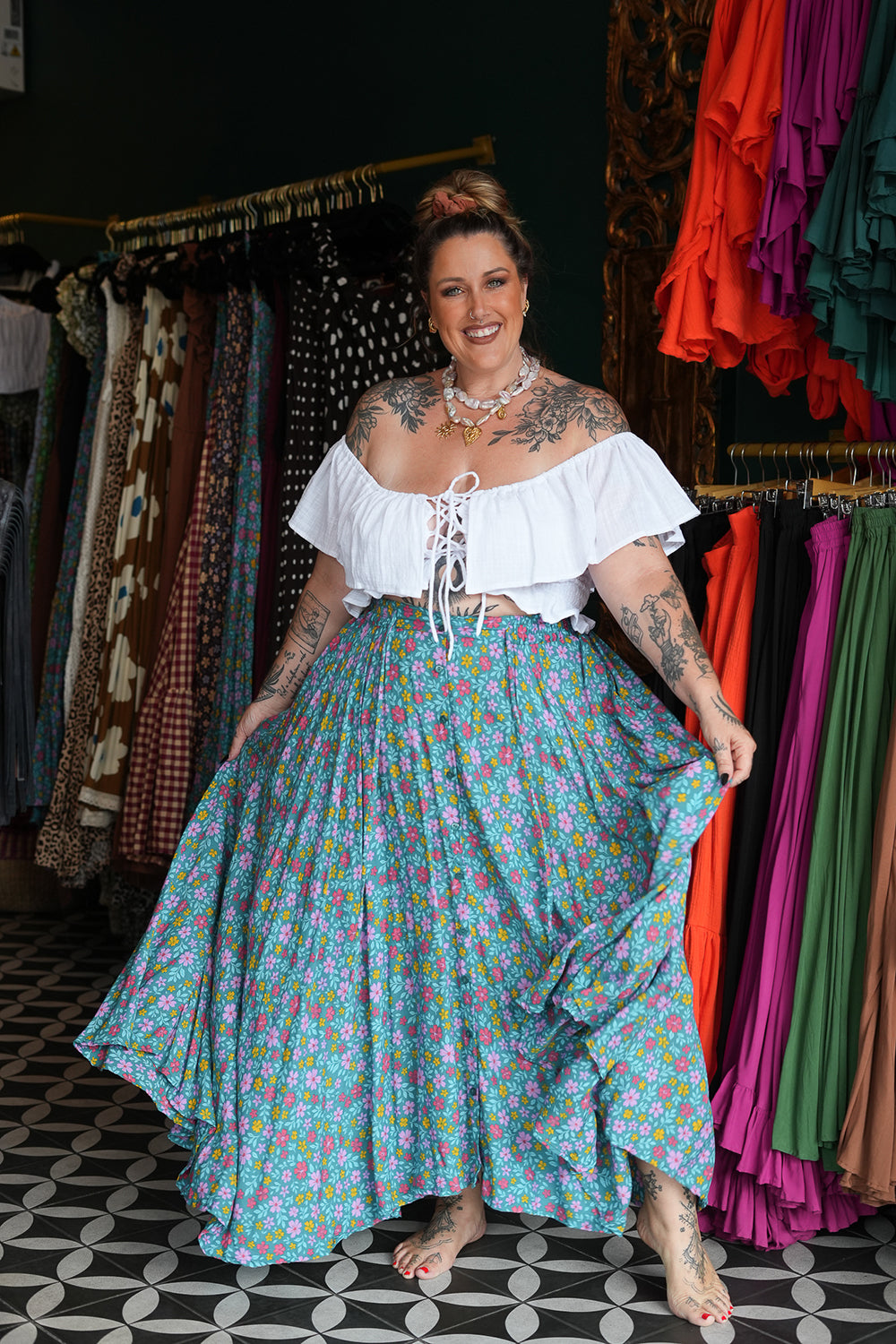 Maria Top in soft White Cotton with an off-shoulder ruffle neckline, adjustable lace up front and shirred waist. Handmade in Bali by Jinx the Label.