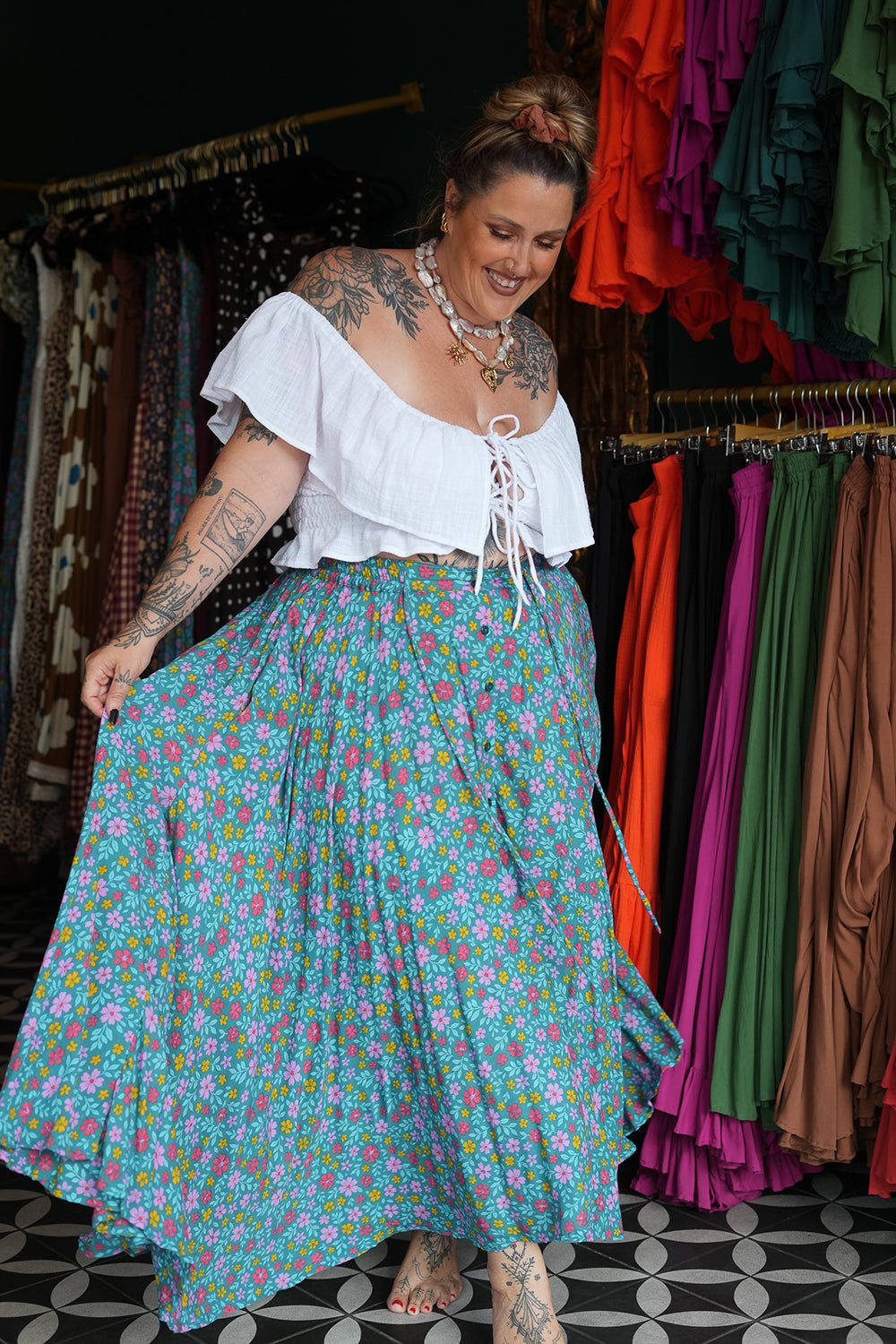 Maria Top in soft White Cotton with an off-shoulder ruffle neckline, adjustable lace up front and shirred waist. Handmade in Bali by Jinx the Label.