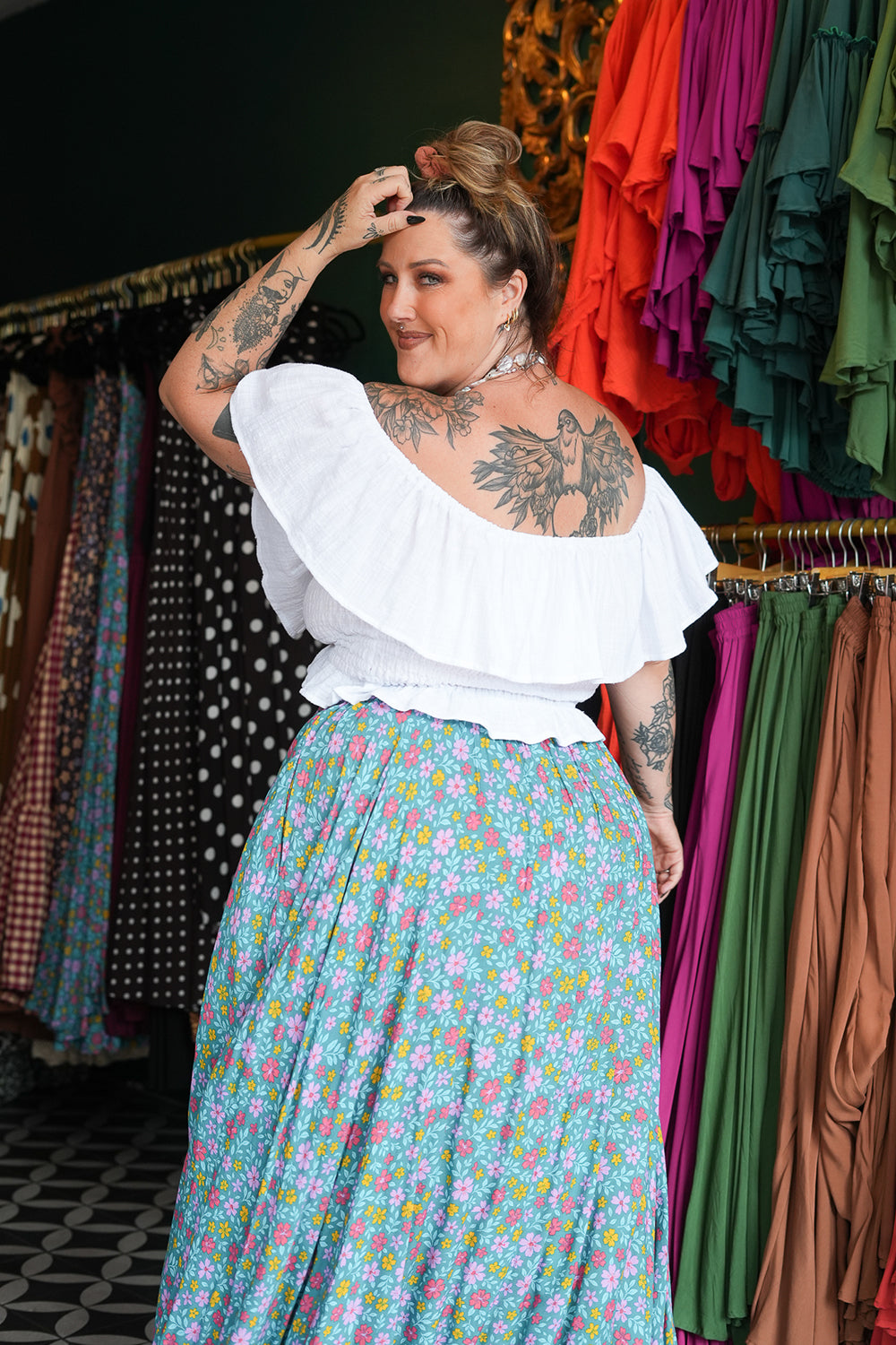 Maria Top in soft White Cotton with an off-shoulder ruffle neckline, adjustable lace up front and shirred waist. Handmade in Bali by Jinx the Label.