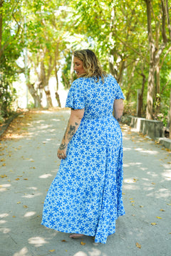 Shop the Mary Maxi Dress in Blue Floral Magic, with butterfly sleeves, deep V-neck and a flowing full-circle skirt. Handmade in Bali by Jinx the Label.