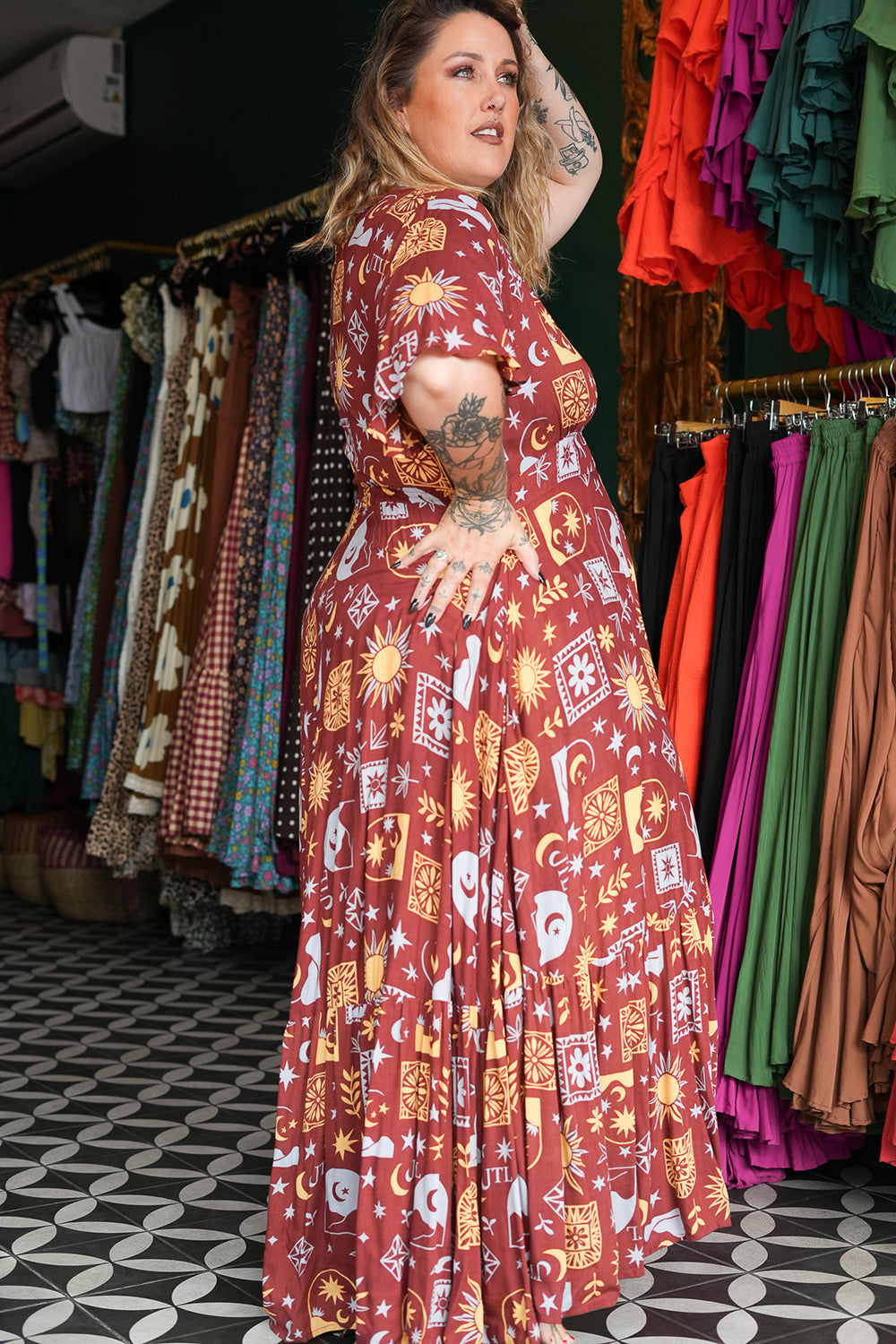 Shop the Mary Maxi Dress in Celestial Moon, with butterfly sleeves, deep V-neck and a flowing full circle skirt. Handmade in Bali by Jinx the Label.