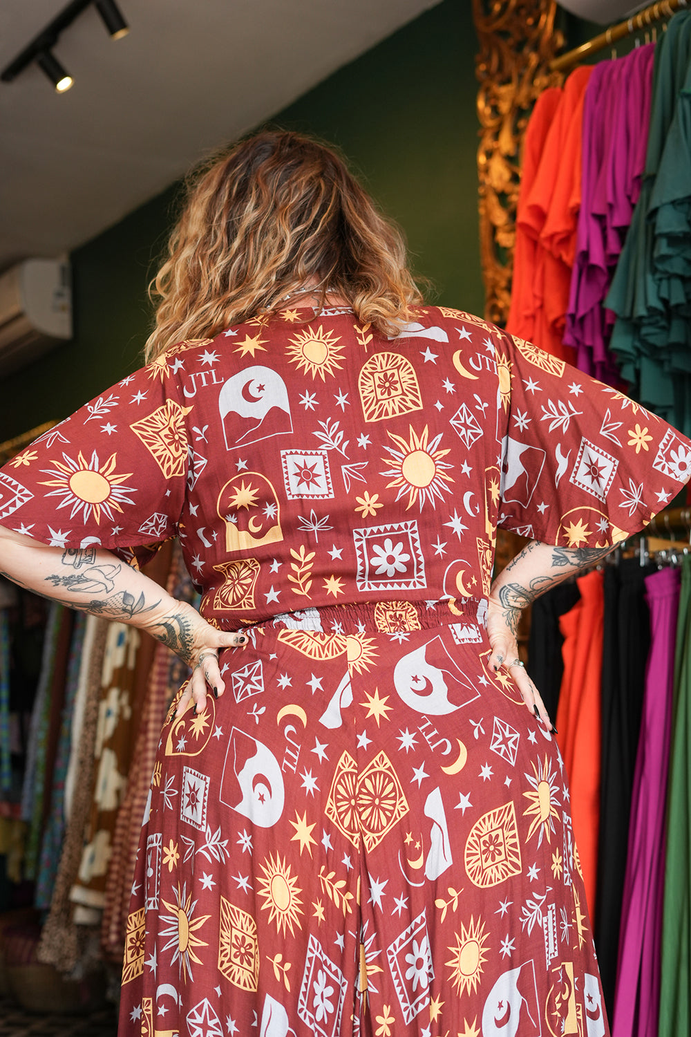 Shop the Mary Maxi Dress in Celestial Moon, with butterfly sleeves, deep V-neck and a flowing full circle skirt. Handmade in Bali by Jinx the Label.