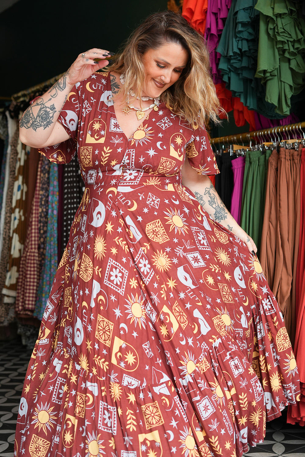 Shop the Mary Maxi Dress in Celestial Moon, with butterfly sleeves, deep V-neck and a flowing full circle skirt. Handmade in Bali by Jinx the Label.