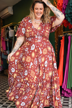 Shop the Mary Maxi Dress in Celestial Moon, with butterfly sleeves, deep V-neck and a flowing full circle skirt. Handmade in Bali by Jinx the Label.
