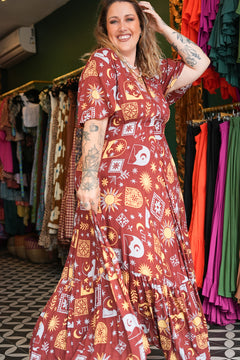 Shop the Mary Maxi Dress in Celestial Moon, with butterfly sleeves, deep V-neck and a flowing full circle skirt. Handmade in Bali by Jinx the Label.