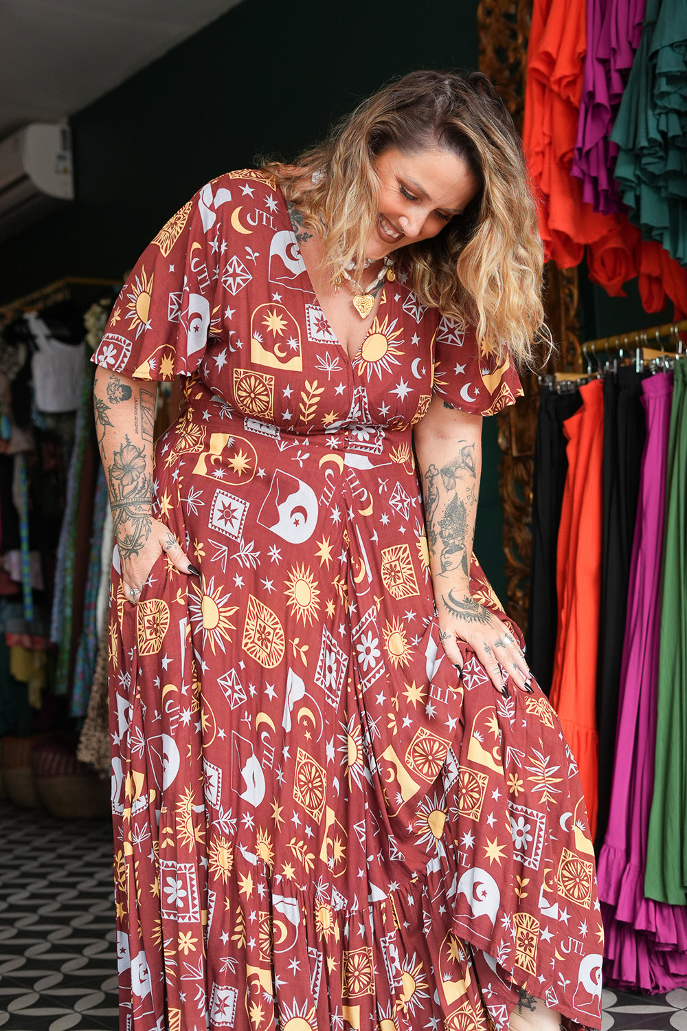 Shop the Mary Maxi Dress in Celestial Moon, with butterfly sleeves, deep V-neck and a flowing full circle skirt. Handmade in Bali by Jinx the Label.