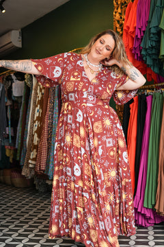 Shop the Mary Maxi Dress in Celestial Moon, with butterfly sleeves, deep V-neck and a flowing full circle skirt. Handmade in Bali by Jinx the Label.