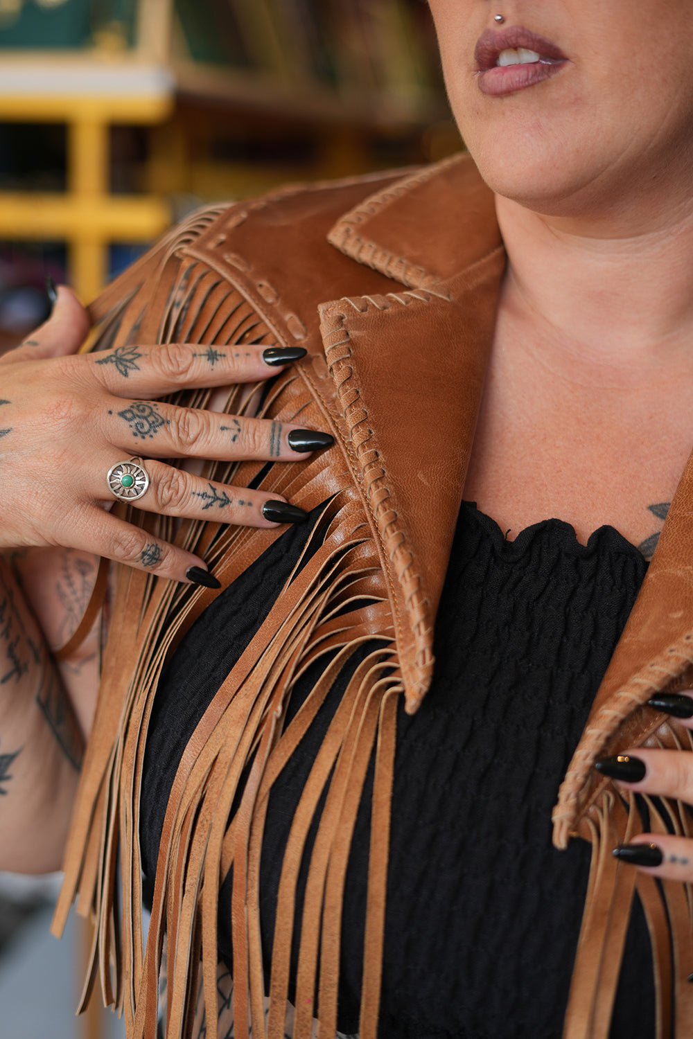 Meet the Nevada Cape in Brown, handcrafted from 100% genuine leather with cascading fringe, Western detailing and statement stars. Handmade with love.