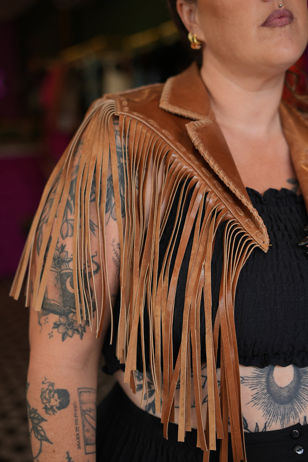 Meet the Nevada Cape in Brown, handcrafted from 100% genuine leather with cascading fringe, Western detailing and statement stars. Handmade with love.