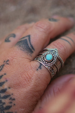 Discover the Nomad Ring by Jinx the Label, a statement sterling silver ring featuring natural turquoise, intricate scrollwork and bohemian detailing.