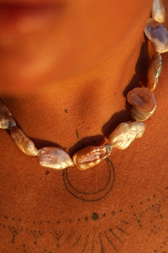 Discover the Ocean Relic Necklace in Wild Pearl, crafted with large freeform natural pearls, each uniquely shaped by nature. Earth Altering by Jinx the Label.