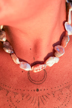 Discover the Ocean Relic Necklace in Wild Pearl, crafted with large freeform natural pearls, each uniquely shaped by nature. Earth Altering by Jinx the Label.