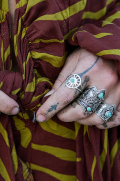 Discover the Solara Ring by Jinx the Label, a sterling silver sun inspired ring featuring a natural turquoise centre stone and delicate bohemian detailing.