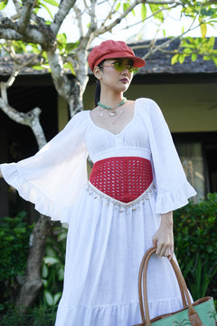 Meet the Tina Maxi Dress in White from Nevada. A dreamy cotton maxi with statement bell sleeves, shirred waist, button detailing and a lace trimmed hem.