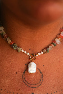 Discover the Wild Earth Necklace in Desert Bloom, with natural stone chips, freshwater pearls and a statement pearl pendant from Earth Altering by Jinx the Label.
