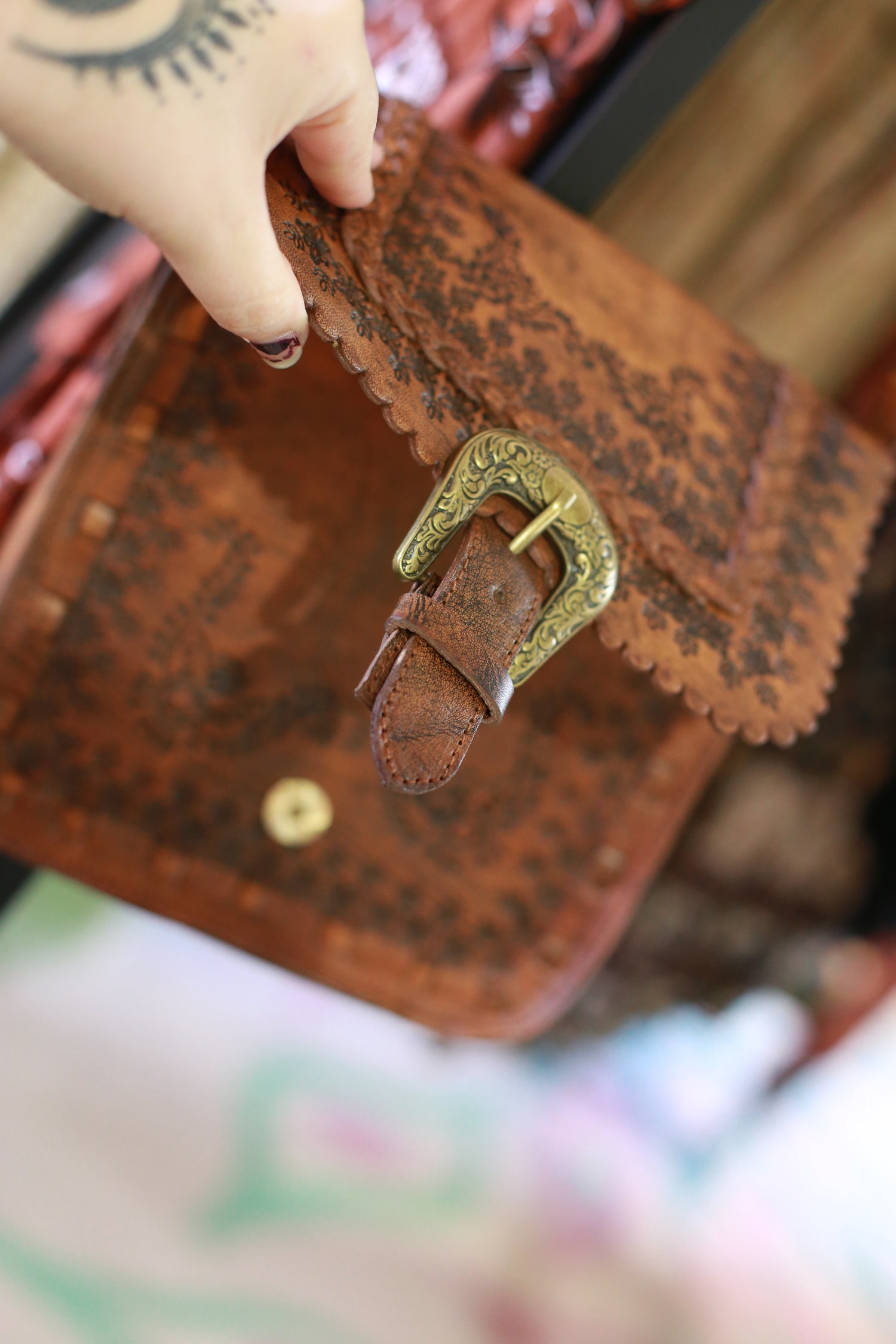 Farrah leather carved bag with buckle